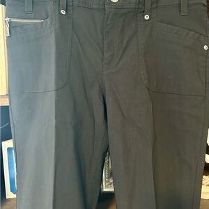 Women’s S-12 Jean style black pant.  Flared bottom. Silver hardware.